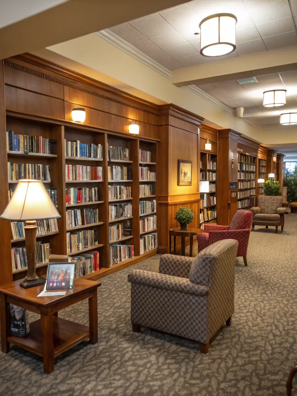 A photo of diverse community members enjoying books in the library, showcasing the library as a vibrant community hub.